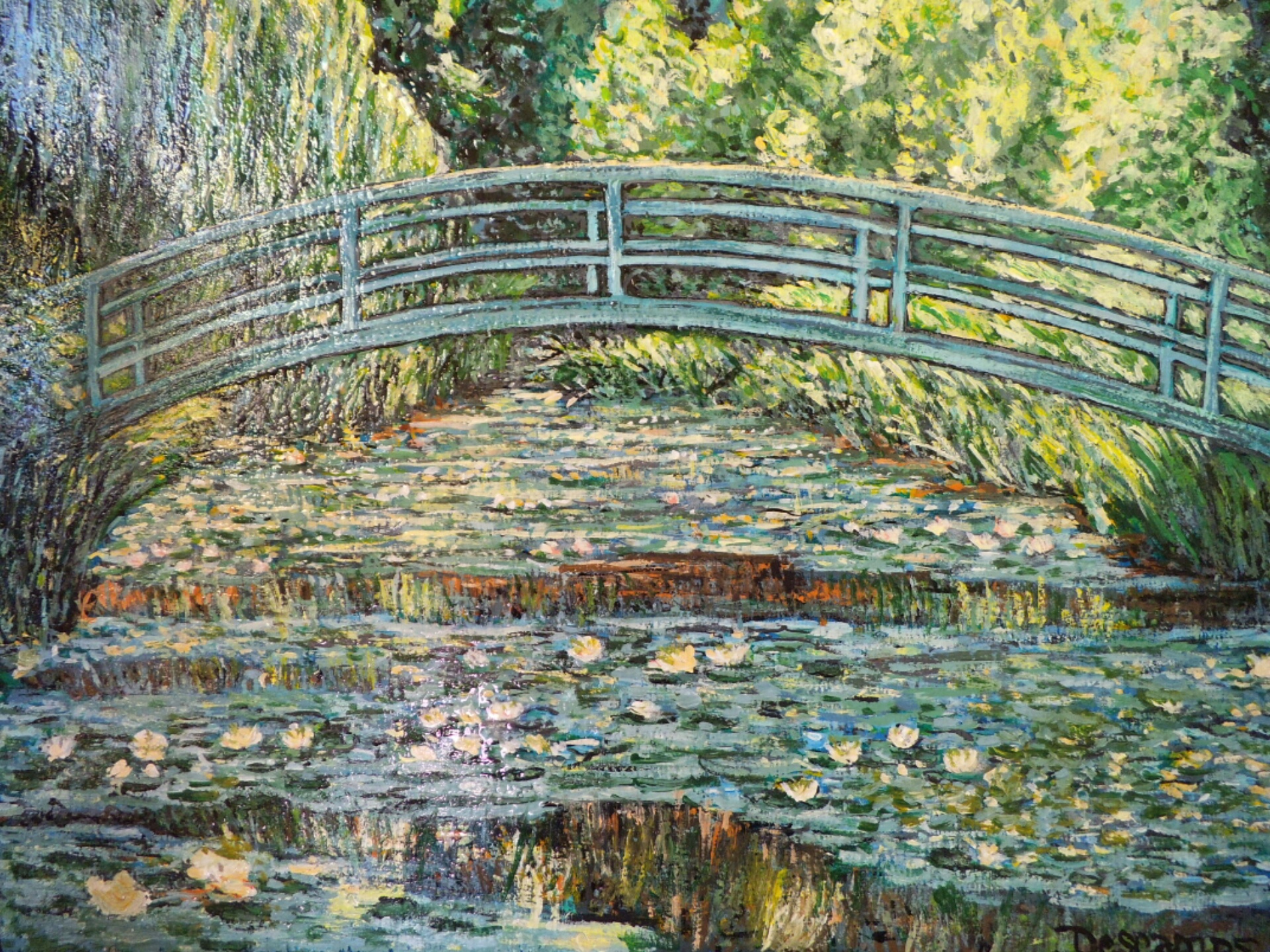The japanese bridge and water lilies pond